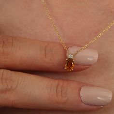 "Citrine Necklace, November Birthstone, Citrine Pendant, Birthstone Necklace, Handmade Jewelry, Citrine Jewelry, Gemstone Necklace, Minaliva * Gold Kt: 14K - 18K * Custom Gold Color: Rose Gold, Yellow Gold, White Gold * Total Diamond CTW: 0,03Ct * Citrine: 1pcs 0.67Ct * Gr: 2,41 * Diamond Color-Clarity: G Color VS Clarity * Setting Type: Pave * Length:  16\", 17'',  18\", 19'', 20\" (measured as end to end, the clasp is included) * Ready to Ship in 1-5 Business Days * Made to Order. Your product Citrine Gold Necklace, Orange Gemstone Necklace, Citrine Jewelry Set, Amber Citrine Necklace With Gemstone Accents, Wedding Citrine Gemstone Necklace, Orange Citrine Gemstone Necklace, Orange Citrine Birthstone Necklace, Teardrop Citrine Gemstone Necklace, Wedding Topaz Gemstone Accent Necklaces