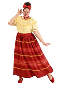 a woman in a red and yellow dress posing for the camera with her hands up