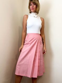 "⚡️ sweet high waisted a-line wrap skirt with accordion pleats at the front. beautiful soft pink color. made by Fundamental Things. 50% polyester 50% rayon. excellent condition! ⚡️ labeled size 14 (modeled on size small, 5'5\") ⚡️ waist 15\"  hips 19.5\" length 27.5\" ------------------------------------------------------------------------------------------- Please message questions prior to purchase. Once shipped, sales are final, no return/exchange. But please contact me if you have any proble Spring A-line Maxi Skirt With Pleated Hem, Feminine A-line Bottoms For Spring, Pink A-line Pleated Skirt, Feminine A-line Pleated Skirt, Spring Skort With Accordion Pleats, Fitted Midi Skirt With Accordion Pleats, Feminine Pleated Maxi Skirt, High Waist Gathered Skirt For Daywear, Accordion Pleated Midi Skirt