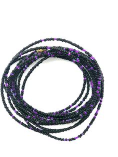 Beautiful black and purple waist beads for the adventurous soul which are gorgeous on any skin tone!  These waist beads have metallic clasps.Waist beads, Boho waist beads, African waist beads, Belly Chain, Boho Beads, Belly Beads - Dusk Lilac Waist Beads**** PROPERLY MEASURE YOUR WAIST ****Place the measuring tape at the exact area you prefer to wear the waist beads.Do not tuck in your stomach when measuring for belly chain.Allow for wiggle space when measuring for breathing room.Thank you for s Black Beaded Necklaces For The Beach, Black Heishi Beads For Beach, Black Beaded Necklace For Beach With Tiny Beads, Adjustable Black Beads For Jewelry Making, Beach Black Beaded Necklace With Tiny Beads, Purple Beaded Chain Bracelets With Round Beads, Purple Beaded Chain Bracelet With Round Beads, Adjustable Beaded Waist Beads, Black Beaded Necklaces With Spacer Beads For Beach