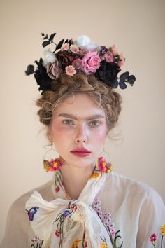 Frida Kahlo inspired flower headband. Perfect for weddings, photoshoots, parties or other events. It is made of artificial/fabric flowers, preserved material and other material used for arranging. Photo: Michaela Durisova photography Model: Kika S. When stored in dry and dark place, our products last 10-15 years. We can also make you other matching accessories. Please message me for more information. :) ---------------------------------------------------------------- SHIPPING INFO For EU orders: Floral Headpiece Crown, Luxury Floral Headpieces For Spring, Luxury Floral Headpieces For Party, Luxury Flower Headpieces For Party, Mexican Hair Jewelry, Luxury Handmade Flower Headpieces For Summer, Mexican Flower Crown With Veil, Mexican Floral Bride Crown, Fiesta Flower Crown Mexican