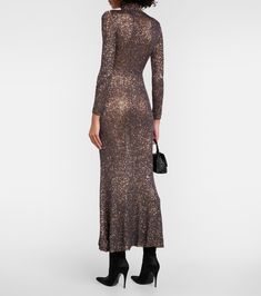 Sequined knitted maxi dress in brown - Balenciaga | Mytheresa Chic Backless Maxi Dress For Party Season, Chic Maxi Dress For Party Season, Luxury Floor-length Fall Dresses, Luxury Fall Gala Dresses, Long Fitted Maxi Dress For Party Season, Floor-length Elastane Dress For Night Out, Fall Evening Dress In Elastane, Evening Dress For Fall In Elastane, Fall Evening Dress Made Of Elastane