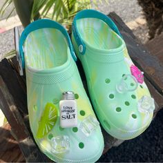 Crocs Unisex-Adult Classic Margaritaville Clog. Mens Size 12. Brand New, Never Been Worn! Find Your Size: Margaritaville Crocs Offer A Roomy Fit. If You Are A Half Size, We Suggest Sizing Down To The Next Largest Whole Size (E.G. If You Are A 7.5, Size Down To A 7). Margaritaville Crocs: These Margaritaville Shoes For Men And Women Are The Perfect Beach Shoes For Margarita Lovers And Jimmy Buffett Fans. Take Your Feet On Vacation: Topped With Iconic Jibbitz Charms Including Ice Cubes, A Zesty Li Margaritaville Crocs, Blue Crocs, Jimmy Buffet, Crocs Clogs, Jimmy Buffett, Lime Wedge, Ice Cubes, Crocs Shoes, Beach Shoes