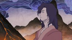 a man with long hair standing in front of mountains and clouds, looking at the sky