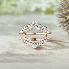 an image of a ring with diamonds on it