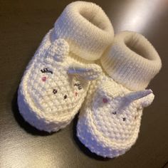 White Knitted Soft Bottom Booties/Socks For Newborn Baby White Winter Booties For Playtime, Winter White Booties For Playtime, Cute White Winter Booties, Comfortable Non-slip White Booties, Cute Winter Booties For Playtime, Casual Hand Knitted Round Toe Booties, Comfortable White Winter Booties, Warm White Winter Booties, Playful White Booties For Playtime