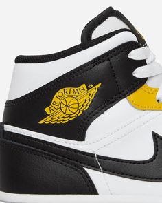 Nike Jordan Air Jordan 1 Mid Sneakers Yellow Ochre / Black / White.The Air Jordan 1 Mid, in this colorway, is one of the most versatile sneakers ever. Never out of context, guaranteed comfort, and an unmistakable design. From the basketball court parquet, it has evolved into the most desired lifestyle silhouette in the world..Leather Upper.Woven Tongue Label.Perforated Toe Box.Air Cushioning.Rubber Outsole.Style Code: DQ8426-701 High-top Sneakers For Light Sports With Logo, High-top Running Sneakers With Logo, Mid-top Logo Sneakers For Sports, Mid-top Sports Sneakers With Logo, Leather Basketball Shoes With Logo, Black Sporty Sneakers With Logo, High-top Sports Sneakers With Logo, High-top Sneakers With Logo For Sports, Black High-top Sneakers With Logo