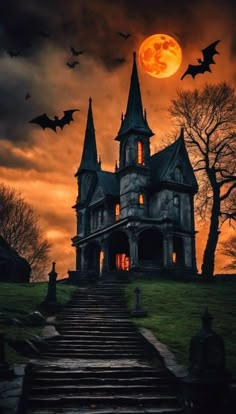 a spooky house with bats flying over it and the moon in the sky