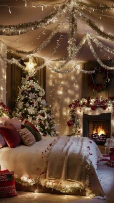 a bedroom decorated for christmas with lights and decorations