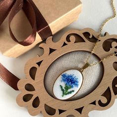 Dainty cornflower necklace is a wonderful gift for romantic women. Jewelry embroidery pendant with small flower is a wonderful gift for wife, mother or daughter. The floral necklace is suitable for every day and for a special occasion. This jewelry perfect accessory for complete your summer look. This pendant is made in the technique of micro-embroidery cross stitch on cotton canvas with cotton threads.  The size of each cross stitch is less than 1 mm. MATERIALS: The color of the base and chain- Mother's Day Flower Pendant Necklace Gift For Mom, Handmade Flower Necklace As Gift For Mom, Gift Flower Necklace With Pressed Flowers, Blue Birth Flower Necklace Gift, Blue Birth Flower Necklace For Gift, Dainty Flower Pendant Necklace As Gift, Handmade Flower Necklace As A Gift For Her, Handmade Delicate Flower Necklace For Mother's Day, Delicate Handmade Flower Necklace For Mother's Day