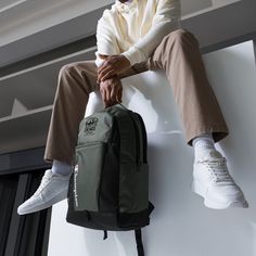 Gear up for your next urban excursion! Crafted with durability in mind, this Champion Backpack boasts ample storage space and a comfortable design, perfect for carrying your essentials while maintaining your streetwear style. * 100% polyester * Dimensions: 18″ × 11.5″ × 6.5″ (45.7 × 29.2 × 16.5 cm) * Front zip pocket with printed Champion brand logo, containing an organizational compartment * Side water bottle pocket * Top carry handle * Top zipper with 2 sliders and zipper pullers * Back and bo Champion Backpack, High Tops Sneakers, Trendy Backpacks, Champion Brand, College Backpack, Streetwear Style, Pocket Top, Style Streetwear, Backpack Purse