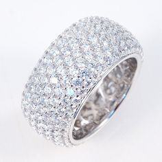 Each carefully selected cubic zirconia are inserted by hand individually by professional jewelers on pure sterling silver 925. The CZ'S in my jewelry are the highest grade in the world. You will not know that it is not a diamond. Once you buy a ZirconZ CZ, you will only want this quality. Gorgeous Color: Black, White, Yellow, Pink Material: Sterling Silver 925 Stone: Cubic Zirconia (CZ) - Signity Stone: Clear CZ Length: 10 mm Height: 3mm THIS RING IS A BIG RING WELL MADE WITH A FILLIGREE BACKING Fantasy Rings, Black Rose Ring, Silver Eternity Ring, Fine Gold Necklace, Luxurious Jewelry, Bling Ring, Eternity Rings, Big Rings, Pompano Beach