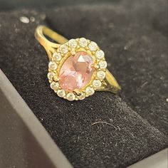 Beautiful Vintage Solid 14kt Yellow Gold Oval Cut Pink Topaz Ring With A Round Cut White Topaz Halo Around It. Ring Is A Size 6, And Has Been Acid Tested. It Is Also Stamped With The 14kt Stamp. Please See All Pictures Of The Ring. Pink Pearl Ring, Pink Topaz Ring, Pink Engagement Ring, Pink Topaz, Halo Ring, Halo Rings, Topaz Ring, White Topaz, 14kt Gold