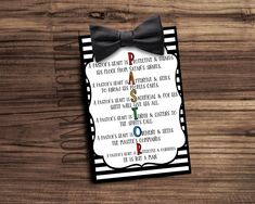 a black and white striped card with a bow tie on it that says, science is important