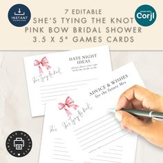 the pink bow bridal shower game cards are being held by a woman's hand