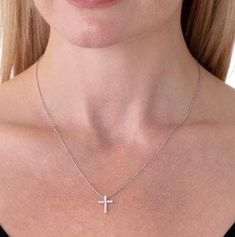 With a simplistic yet beautiful design, the 18k white gold Medium Signature Cross Diamond Necklace. Approx. Total Carat Weight: 0.32STYLE: HFPSIGCR00328W Modern White Gold Diamond Necklace For Formal Occasions, White Gold Platinum Diamond Necklace With Pave Setting, White Gold Necklaces With Platinum Diamond Cut, Modern Sterling Silver Necklaces In White Gold, Modern White Gold Sterling Silver Necklaces, Modern White Gold Necklace With Diamond Accents, Modern White Gold Diamond Necklace With Polished Finish, White Gold Platinum Necklace With Diamond Cut, White Gold Platinum Diamond Cut Necklace