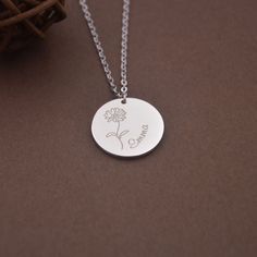 "This personalized Birth Month Flower Name Necklace is a perfect gift for birthday, anniversary, christmas, bridesmaid, graduation, wedding, engagement, best friend, mom and sisters. Product Description Metal: High Quality 925 Sterling Silver Color: silver, gold, rose gold Pendant Height:20 Millimeter Chain length: 14\",16\",18\",20\",22\" The birth flower necklace will arrive inside a lovely gift box ready for gift giving. All pieces will come with a 1.5\" extension chain so you can FINE TUNE t Customizable Flower Shaped Jewelry For Personalized Gift, Customizable Flower-shaped Jewelry For Personalized Gift, Customizable Flower Pendant Jewelry For Personalized Gift, Customizable Flower Shape Jewelry For Gift, Engraved Flower Jewelry For Personalized Gift, Flower-shaped Engraved Jewelry For Personalized Gifts, Personalized Engraved Flower Jewelry, Elegant Customizable Flower Necklace, Elegant Customizable Flower Shaped Necklace