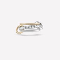 The Cassia SG features a central .925 sterling silver band of pavé-set white diamonds framed by two full round bands in 18k yellow gold and .925 sterling silver. Two contrasting connectors in sterling silver and yellow gold link all three bands, allowing the Cassia SG to be worn spread across multiple fingers or stacked as a sculptural whole. Each Cassia SG is individually handmade in Los Angeles. Bands: 18k yellow gold, .925 sterling silver 1.7mm gauge 18k yellow gold band 2.8mm gauge .925 ster Unisex Rings, Abstracted Art, Jewelry Knowledge, Stone Ornaments, Luxury Jewelry Brands, Shimmer Shine, Gold Link, Luxury Rings, Pave Ring