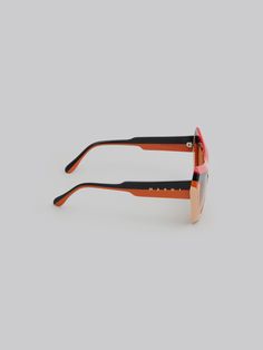 Devil's Pool sunglasses featuring a squared shape, crafted from shiny acetate with multicolour stripes. Brown lenses. Sunglasses Shop, Lenses, Stripes, Pool, Sunglasses, Orange