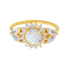 Calling all opal lovers... The Opal and Diamond Sunflower Queen ring will make quite the statement! This ring features a simulated opal and a crown of simulated diamonds. Fit for a queen! Wear the Sunflower Queen ring as a standalone, or add one or two of the Rainbow Moonstone and Diamond Sunrise Arc ring for an extra bold look!     Product Description: 18kt gold vermeil, 6mm round simulated opal, simulated diamonds To extend the life of your gold plated and vermeil jewelry, avoid wearing when w Queen Rings, Bijoux Art Nouveau, Diamond Videos, The Sunflower, Rose Gold Band, Vermeil Jewelry, Rings Cool, Mens Jewelry Bracelet, Heart Jewelry