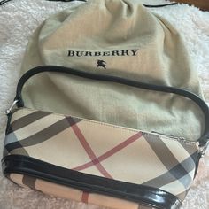 Burberry Supernova Check Pochette Bag Shoulder Bag Description Burberry Shoulder Bag Neutrals Super Nova Check Pattern Silver-Tone Hardware Single Shoulder Strap Leather Trim Embellishment Canvas Lining Zip Closure At Top Includes Dust Bag Approximate Item Measurements Shoulder Strap Drop: 5.75" Height: 5" Width: 10.25" Depth: 3.75” Excellent Condition See Photos For Micro Spots Burberry Shoulder Bag, Super Nova, Burberry Bag, Check Pattern, Bag Shoulder, Leather Trim, Black And Tan, Leather Trims, Leather Straps