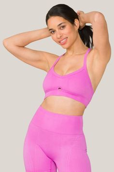 Alala women's Barre cami seamless bra in dark pink Seamless Pink Bra For Gym, Pink Medium Support Bra For Workout, Pink Workout Bra With Medium Support, Supportive Sports Bra In Pink, Pink Medium Support Workout Bra, Pink Athleisure Bra With Medium Bust Support, Pink Athleisure Sports Bra With Adjustable Straps, Pink Athleisure Bra With Light Support, Pink Stretch Athleisure Bra