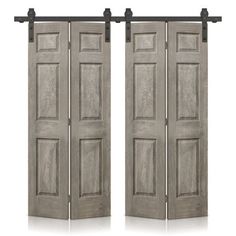 two wooden doors with black hardware on each side