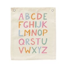 a white bag with multicolored letters on it