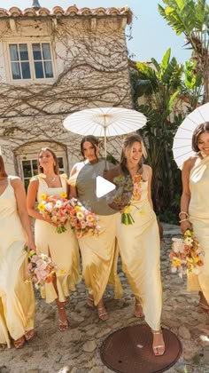 the bridesmaids are all dressed in yellow dresses and holding white parasols