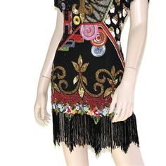 "This 80s-era silk trophy dress from Naeem Khan - Riazee features a stunningly sequined & beaded pop art design, beaded zig-zag fringe on sleeves and hemline, keyhole back, and mini length skirt. Luxuriously well-made and ready to turn heads! Dress is fully lined, has removable shoulder pads, and zips up the back. Best fits size xs or small (please check measurements below). Accessories not included. Payment plans available. Approximate Flat Measurements: Multiply times 2 for bust, waist, an Fitted Mini Dress For Carnival, Fitted Mini Flapper Dress With Fringe, Fitted Mini Length Flapper Dress With Fringe, Embellished Flapper Dress For Summer Costume Party, Summer Embellished Flapper Dress For Costume Party, Embellished Flapper Dress For Costume Party, Fitted Sequin Dress With Fringe For Summer, Fitted Flapper Dress With Beaded Fringe For Costume Party, Fitted Beaded Fringe Flapper Dress For Costume Party