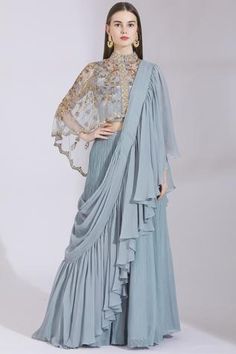 Shop for Ayesha Aejaz Grey Georgette Draped Ruffle Lehenga Saree for Women Online at Aza Fashions Draped Lehenga, Drape Lehenga, Asymmetric Cape, Mandarin Collar Blouse, Ruffle Lehenga, Grey Lehenga, Sheer Cape, Grey Saree, Indian Outfits Lehenga