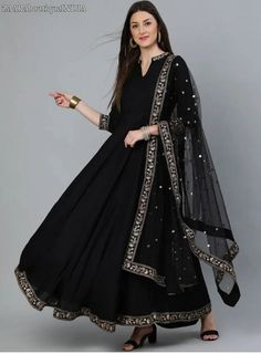 HAND CRAFTED DRESS DESCRIPTION *Black embroidered woven fit and flare dress, has a mandarin collar, three-quarter sleeves, and flared hem *Comes with a matching sequinned dupatta *Size:- Dupatta Length: 2.25 m Dupatta Width: 40 m *Fabric:- Viscose Rayon *Wash Care:- Dry Clean AVAILABLE IN 6 SIZES THEY ARE IN FOLLOWING MEASUREMENTS IN INCHES:- XS:- Bust-34/To Fit Waist-28/Length-54/Hip-38 S:- Bust-36/To Fit Waist-30/Length-54/Hip-40 M:- Bust-38/To Fit Waist-32/Length-54/Hip-42 L:- Bust-40/To Fit Bollywood Chanderi Dress, Embroidered Maxi Dress For Diwali, Traditional Semi-stitched Maxi Dress With Dabka Work, Traditional Black Gown With Dabka Work, Bollywood Style Dress With Dupatta For Transitional Season, Traditional Maxi Dress With Dabka Work For Diwali, Traditional Diwali Maxi Dress With Dabka Work, Black Anarkali Gown With Dabka Work, Transitional Anarkali Dress In Georgette