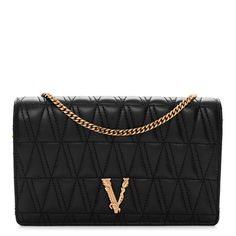 This is an authenticVERSACE Nappa Quilted Virtus Clutch Bag in Black. This chic shoulder bag is crafted of quilted nappa leather in black. The bag features an optional gold chain shoulder strap and a front-facing snap closure with a polished gold V. The flap opens to a smooth leather interior with card slots and a zipper pocket. Luxury Black Quilted Wallet On Chain, Luxury Quilted Rectangular Wallet On Chain, Black Quilted Wallet On Chain For Evening, Luxury Quilted Wallet On Chain For Evening, Luxury Quilted Leather Wallet On Chain, Luxury Quilted Clutch Shoulder Bag, Phone Pouch, Chain Shoulder Bag, Leather Interior