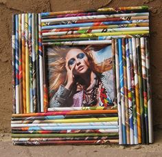 a multicolored photo frame with a woman's face painted on it