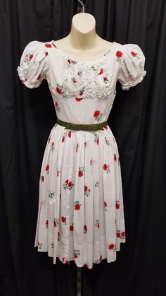 Vintage 1950's Joan Miller Juniors White Lightweight Cotton Floral Print Ruffle Accented Fit & Flare Full Skirt Garden Party Sun Dress w Matching Belt.  Soft & Lightweight, beautiful handiwork, 1 left side zipper closure.  Excellent condition - see pics.     Dress Measurements: bust 34, length top to bottom 40, waist 24, hem 4 1/2, shoulder to shoulder 13 1/2, neck opening 10 1/2, sleeve 7, belt 26 inches. 1950s Style Vintage Dress For Summer Garden Party, Fitted Vintage Dress For Garden Party, 1950s Short Sleeve Vintage Dress For Garden Party, 1950s Lined Dress For Garden Party, 1950s Style Lined Dress For Garden Party, Lined Vintage Dress For Garden Party, Fitted 1950s Vintage Dress For Garden Party, Vintage Mini Dress For Garden Party, Vintage Dress For Garden Party