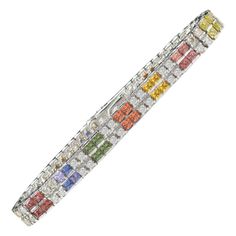 Brliiant Magnificent, Multi color Sapphire Bracelet AAA Quality Sapphires Princess -cut shape, Total of 6.00 carat. Round Diamonds total of 3.00 carat GH -SI. 14K White Gold 27.0 Grams. Lenght 7' Inch. Bracelet widith is approx 6.5 mm Sapphire Bracelet, Square Pattern, Diamond Bracelets, Princess Cut, White Gold Diamonds, Matching Earrings, Link Bracelets, Round Diamonds, Gold Diamond