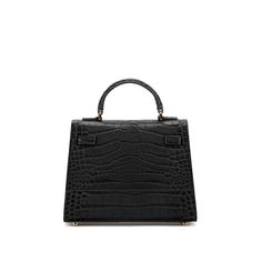 DESIGN
The stunning Kim shoulder bag is perfect for adding a dash of chic to any ensemble. Made in Italy from croco embossed calf skin, this versatile piece has an intriguing look, that will complete any style in a memorable way. This style can be used as a handbags or a shoulder bag, taking you from day to evening with ease.
DESCRIPTION
Made In ItalyCroco embossed leather with matching trimMicrofiber interiorGold-toned detailing
DETAILS
6.7"h x 3"w x 9"l3" handle drop35" to 47" detachable/adjus Designer Crocodile Pattern Top Handle Shoulder Bag, Formal Crossbody Shoulder Bag With Crocodile Pattern, Luxury Evening Bag With Crocodile Pattern, Luxury Crocodile Pattern Shoulder Bag For Office, Evening Satchel Shoulder Bag With Crocodile Pattern, Evening Crocodile Pattern Top Handle Shoulder Bag, Designer Crocodile Pattern Shoulder Bag For Evening, Elegant Evening Shoulder Bag With Crocodile Pattern, Evening Bag With Crocodile Pattern And Top Handle