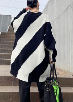 For Spring Black White Striped Knitted Clothes O Neck Plus Size Knit Tops Materials used:knit fabricMeasurement:One size fits all for this item. Please make sure your size doesn't exceed this size: BUST-130cm length 79cm / 30.81"bust 130cm / 50.7"Waist 130cm / 50.7"hem 120cm / 46.8" Knitted Clothes, Knit Tops, Knit Outfit, Black Orange, Orange Black, One Size Fits All, Knit Top, White Stripe, Knitted Fabric