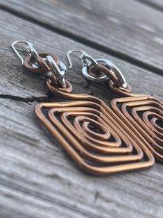 Copper Colored Square Aluminum Earrings in Silver, With Sterling Silver Earwire - Etsy Unique Nickel-free Copper Wire Earrings, Silver Copper Wrap Earrings Gift, Metal Spiral Earrings With Ear Wire, Spiral Metal Earrings With Ear Wire, Unique Nickel-free Wire Earrings, Silver Drop Earrings With Copper Wire, Adjustable Silver Wrap Earrings In Copper, Adjustable Silver Copper Wrap Earrings, Silver Hypoallergenic Copper Earrings