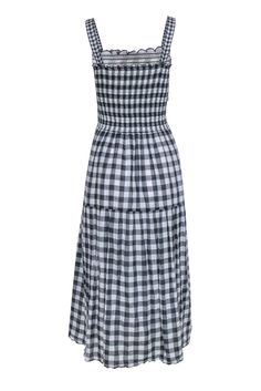 We're gaga for gingham here at Current Boutique, and this breezy beauty from The Great is no exception! Made in a light and airy maxi silhouette with a posh gingham print and chic smocked bodice, this flowy frock is perfect for those sweet summer months. Go totally fab for the farmers' market, brunch and beyond when you pair this darling dress with strappy sandals and a cute straw bag. Size L 100% Cotton Pullover Lined skirt Straight, scalloped neckline Sleeveless All-over gingham print Smocked Gingham Maxi Dress, Smocked Maxi Dress, Skirt Straight, Scalloped Neckline, Darling Dress, Sweet Summer, Cotton Pullover, Gingham Print, Summer Months