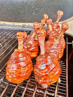 some meat is cooking on the grill and it looks like they have been cooked for dinner