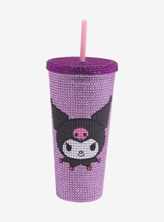 a purple cup with a black and white cat design on it, sitting next to a pink straw