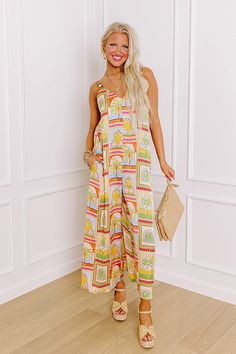 - Transport yourself to a tropical paradise with this stunning jumpsuit! With a luxe satin finish, this piece features a vibrant and colorful tropical print that exudes island vibes. The silky fabric drapes beautifully, offering both comfort and elegance, making it the perfect choice for a sunny getaway or a summer get together. Embrace the spirit of the tropics and make a bold fashion statement with this eye-catching jumpsuit. - Unlined material with a satin finish and a colorful tropical theme Tropical Printed Jumpsuit For Day Out, Tropical Printed Jumpsuits And Rompers For Day Out, Multicolor Maxi Length Jumpsuits And Rompers For Vacation, Beach Multicolor Maxi Jumpsuits And Rompers, Summer Beach Jumpsuits And Rompers With Vibrant Print, Tropical Multicolor Jumpsuits And Rompers For Day Out, Multicolor Maxi-length Jumpsuits And Rompers For Beach, Multicolor Maxi Length Jumpsuits And Rompers For Beach, Multicolor Print Jumpsuits And Rompers For Summer Vacation