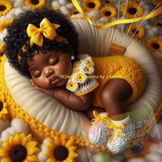 a baby is sleeping on a blanket with sunflowers in the background and a yellow ribbon around it