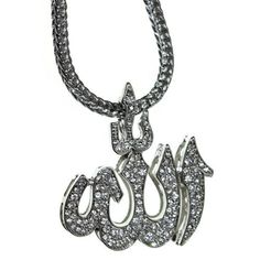 Dazzling Allah symbol pendant on a Franco necklace hip hop chain for men. Big and chunky sparkling pendant measures approximately 2"Lx2"H inches. 36" x 4mm chain with lobster claw clasp. Allah symbol pendant charm is nicely encrusted with clear stones, silver tone finish over base metal for a bright shine. 100% FREE SHIPPING in USA. Order now! White Bling Necklaces For Streetwear, White Bling Jewelry For Streetwear, Personalized Silver Necklace For Streetwear, Streetwear Cubic Zirconia Necklace With Bling, Streetwear Bling Necklace With Cubic Zirconia, Iced Out Diamond Necklace For Streetwear, Silver Chain Link Jewelry For Streetwear, White Chain Jewelry For Streetwear, White Pendant Necklace For Streetwear