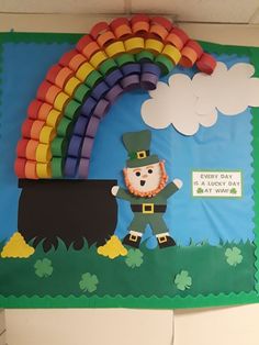 a st patrick's day bulletin board with a leprechaun and rainbow