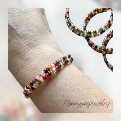 Add to your holiday season with this festive Christmas beaded bracelet. The bracelet wraps around your wrist 2 times. This would make a great Secret Santa gift, stocking stuffer, or a little something for yourself. The bracelet is made with 4mm translucent seed beads on a silver-toned memory wire. Adjustable Multicolor Bracelets For Holiday, Adjustable Multicolor Bracelet For Holiday, Colorful Beaded Jewelry For Holiday Gifts, Holiday Jewelry Gift With Colorful Beads, Holiday Gift Jewelry With Colorful Beads, Christmas Party Beaded Bracelets, Multicolor Beaded Bracelets For Holiday, Red Tiny Beaded Bracelets For Party, Red Beaded Bracelets With Tiny Beads For Party