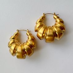 ~ Surgical graded stainless steel vacuum plated with 18K gold, ~ tarnish free, ~ hollow, have some weight due to the size. ~ Two finishes. ~ Sold as pair.  ~ The most adorable croissant hoop earrings. Bold and unique.  ~ Vintage inspired.  ~ we ship in 1-3 days. ~ all purchase come with complimentary jewelry box and pouch. Modern Gold Hoop Plug Earrings, Gold Hypoallergenic Hoop Plug Earrings, Hypoallergenic Small Hoop Gold Plug Earrings, Gold Hoop Plug Earrings, Small Hoop Gold Plug Earrings, Nickel-free Gold Hoop Plug Earrings, Gold Chunky Earrings, Earrings Edgy, Earrings Bold