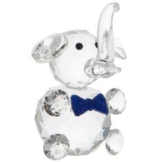 an elephant figurine with a blue bow tie