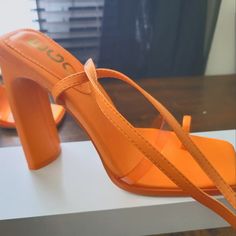 Fits More Like 8 1/2-9 Shoe,Never Worn,Wrap Around Ankle. Casual Orange Heels, Orange Block Heels With Wrapped Heel, Casual Orange Heels For Party, Orange Open Toe Heels With Wrapped Heel, Casual Orange Synthetic Heels, Casual Orange Ankle Strap Heels, Orange Synthetic Heels With Round Toe, Orange Synthetic Round Toe Heels, Trendy Orange Synthetic Heels